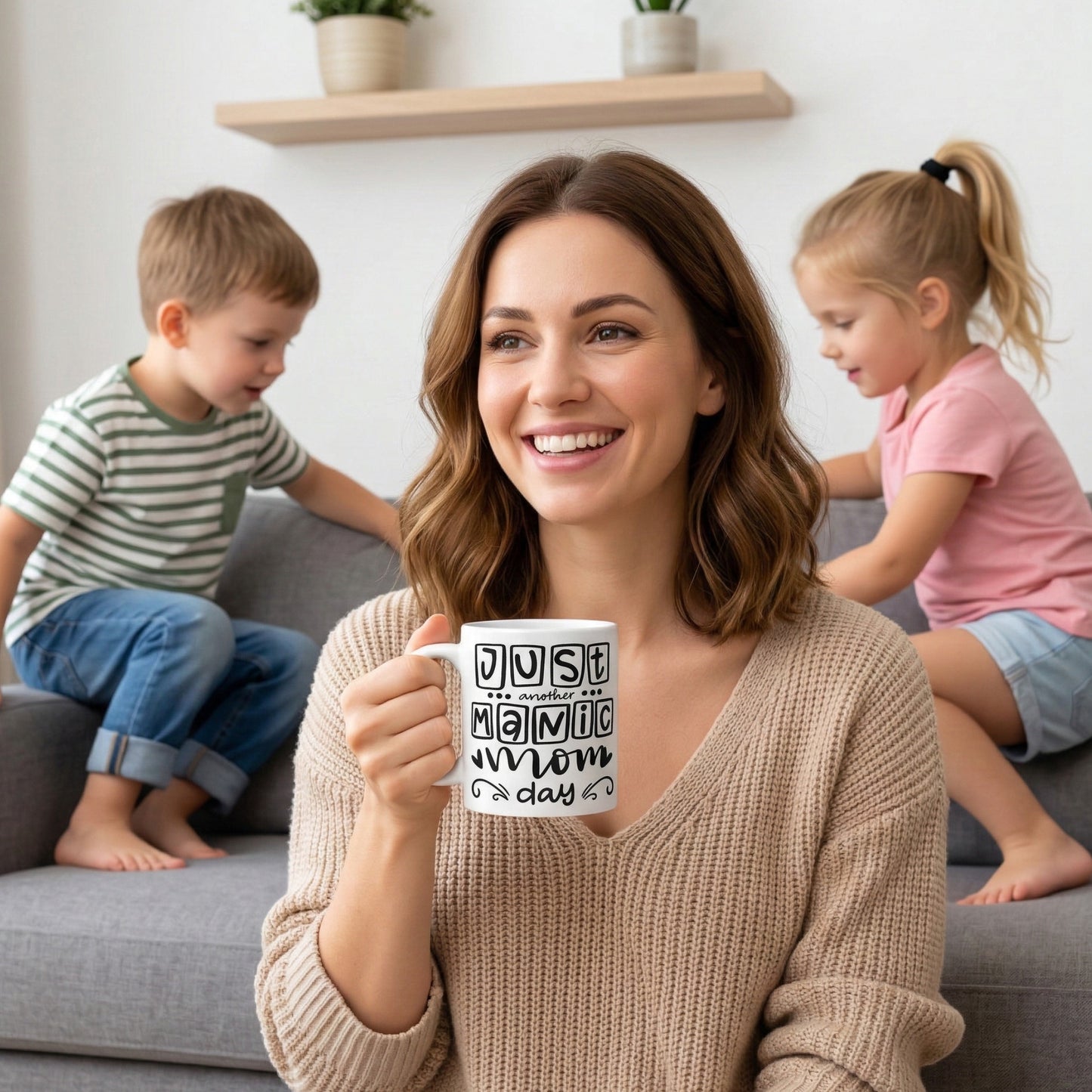 Smiling mum enjoying coffee from a "Just Another Manic Mom Day" mug while her children play in the background. Funny mom life coffee mug celebrating the chaos of motherhood, perfect as a mom gift or Mother's Day gift.