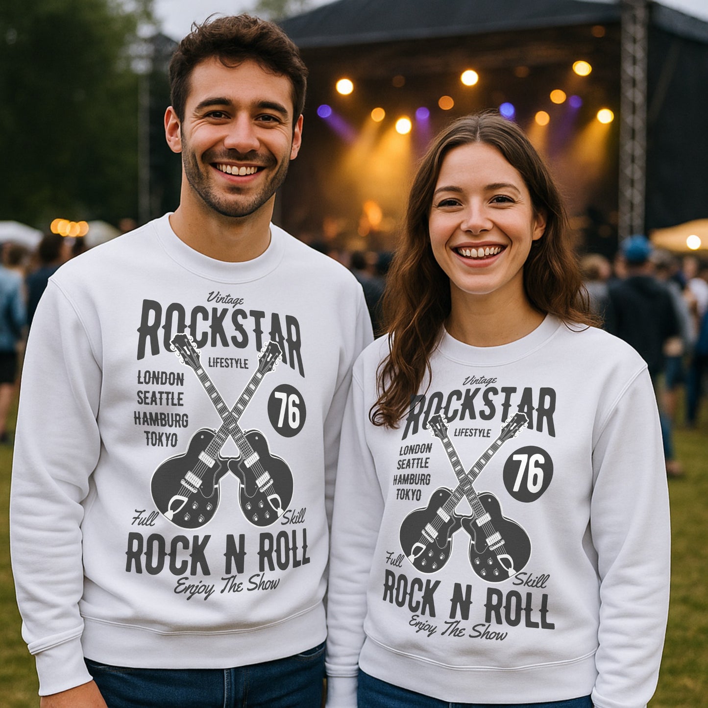 Two people wearing matching white vintage rockstar sweatshirt with bold retro guitar graphic and tour-inspired design, at an outdoor event.