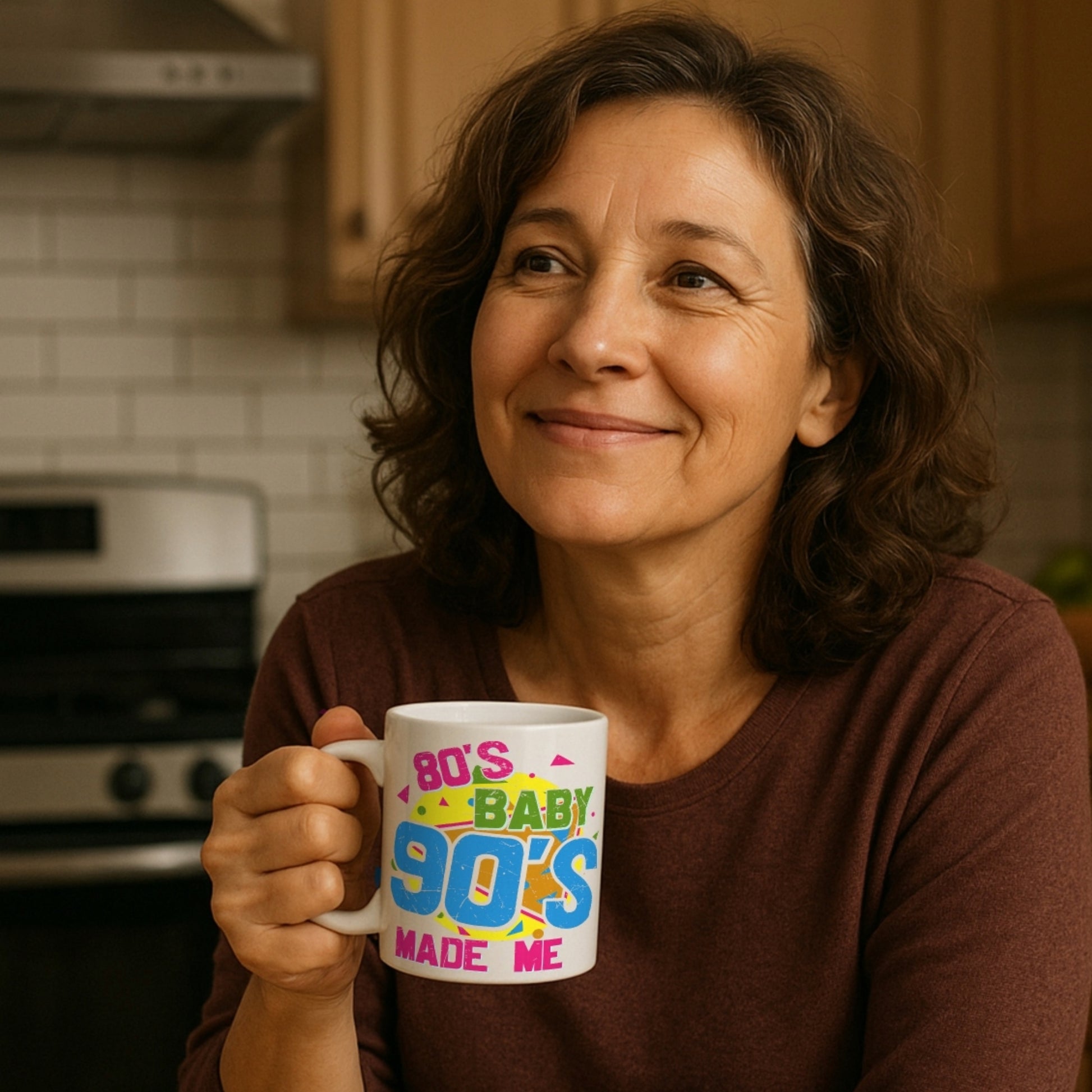Woman holding a mug 80s Baby 90s Made Me Coffee in a kitchen