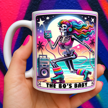 Close-up lifestyle mockup of an 80s Baby Skeleton retro coffee mug featuring a colourful neon skeleton on roller skates with rainbow hair, vintage headphones, cassette player, boombox, and tropical beach sunset artwork. Held in hand against a vibrant retro-inspired background.