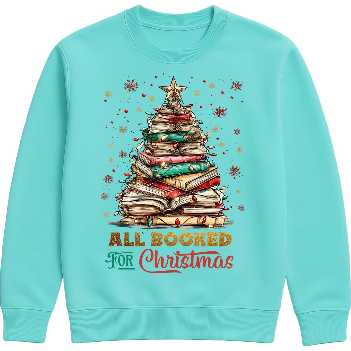 Peppermint “All Booked for Christmas” sweatshirt featuring a whimsical book-stack Christmas tree with lights and a star, styled in a cozy holiday aesthetic.