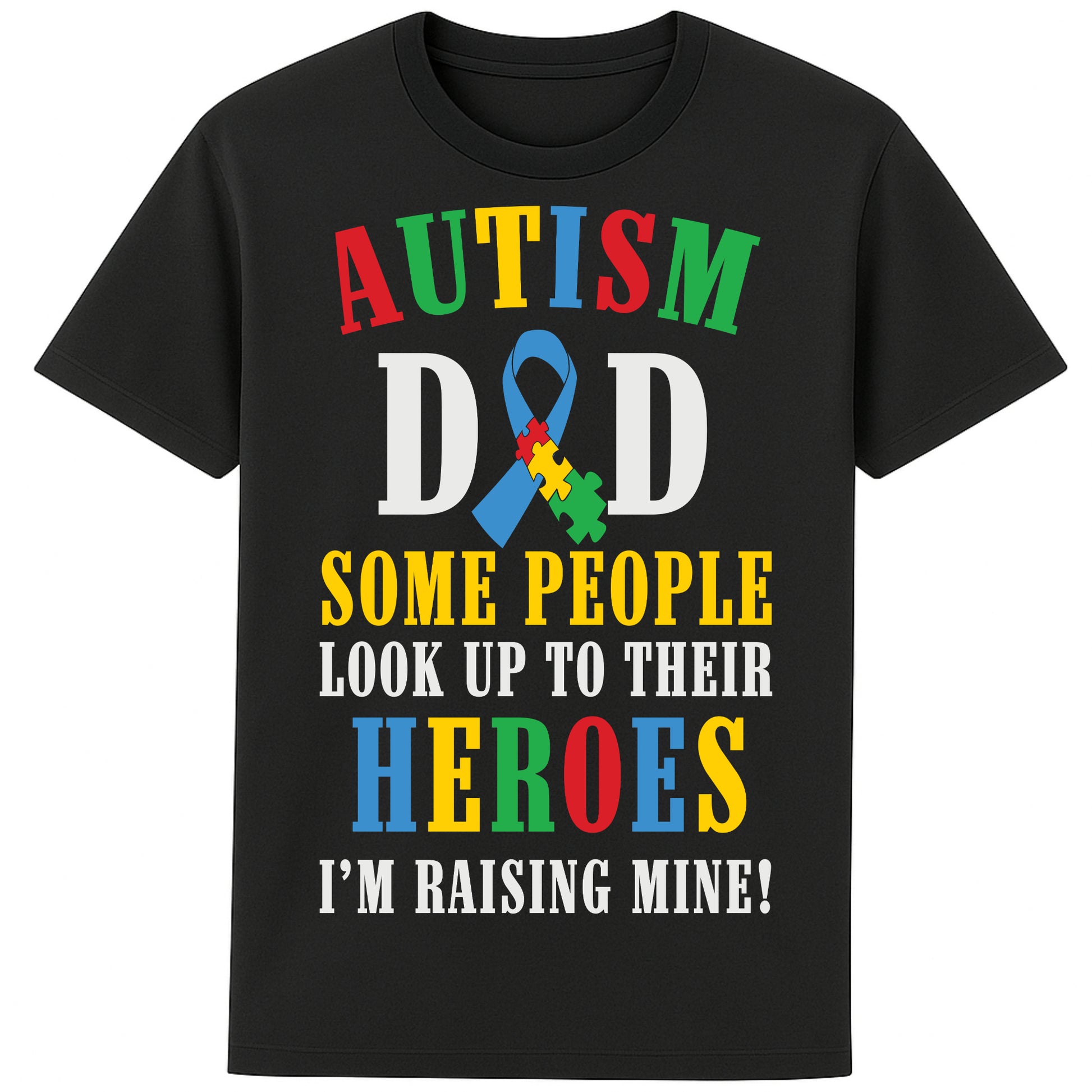 A black t-shirt with bold, colorful text reading: AUTISM DAD SOME PEOPLE LOOK UP TO THEIR HEROES I'M RAISING MINE," The design celebrates fatherhood and pride in raising a child with autism.