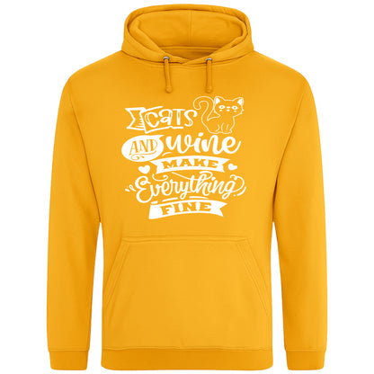 A cozy gold hoodie featuring a playful design with a cat illustration and the phrase "Cats and Wine Make Everything Fine" printed on the front.