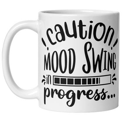 White ceramic coffee mug with bold black text that reads “Caution! Mood Swing in Progress…” — a humorous gift idea, 