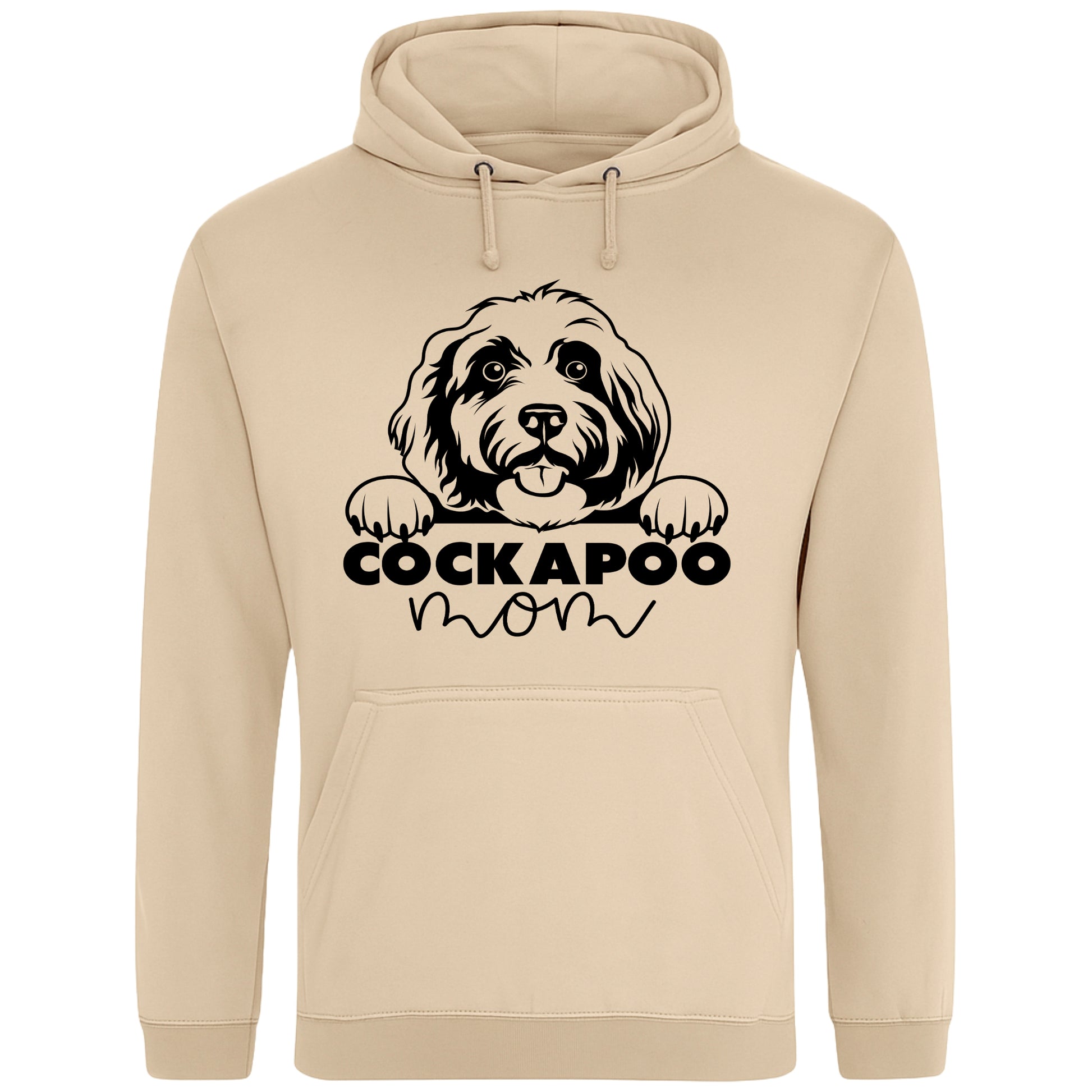 A nude colour hoodie with a playful design featuring a cartoon Cockapoo dog peeking over the bold text 'Cockapoo Mom' in a mix of black and pink fonts. The dog has a cute expression with its tongue out and paws hanging over the text."