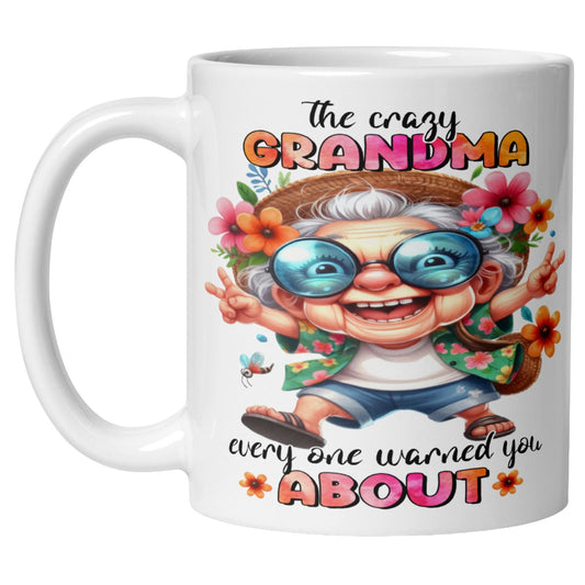 Funny grandma coffee mug featuring a colourful cartoon grandma wearing sunglasses with the phrase "The Crazy Grandma Everyone Warned You About", perfect grandma gift, grandmother gift, grandma birthday gift, and Grandparents Day gift.