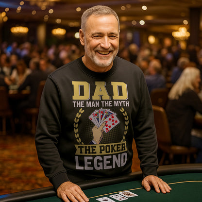 A man in a casino wearing a sweatshirt that says “Dad: The Man, The Myth, The Poker Legend” with poker card design for dads who love poker