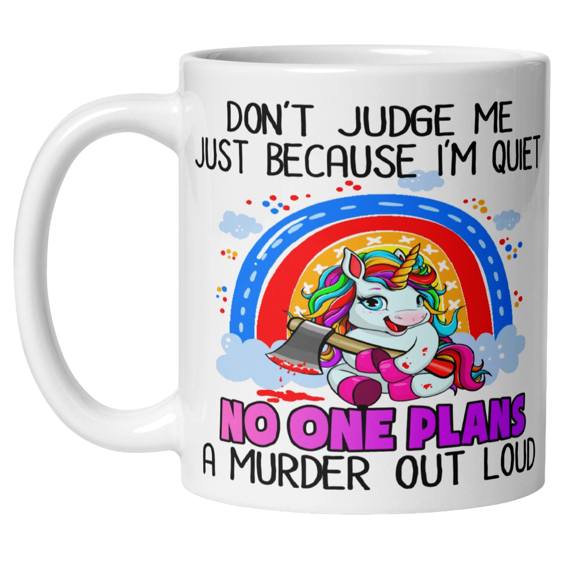 White ceramic mug with a rainbow unicorn holding an axe, framed by a rainbow and clouds, with humorous text about being quiet and planning a murder.