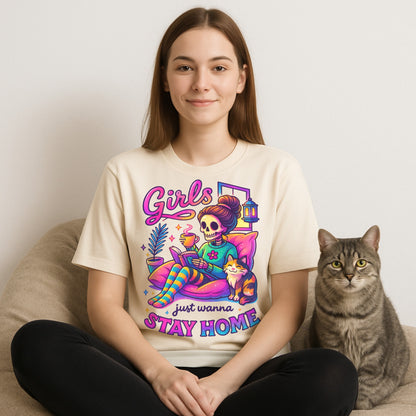 Woman wearing a graphic t-shirt featuring a playful skeleton girl lounging at home with her cat, coffee, and book — perfect for spooky cute vibes