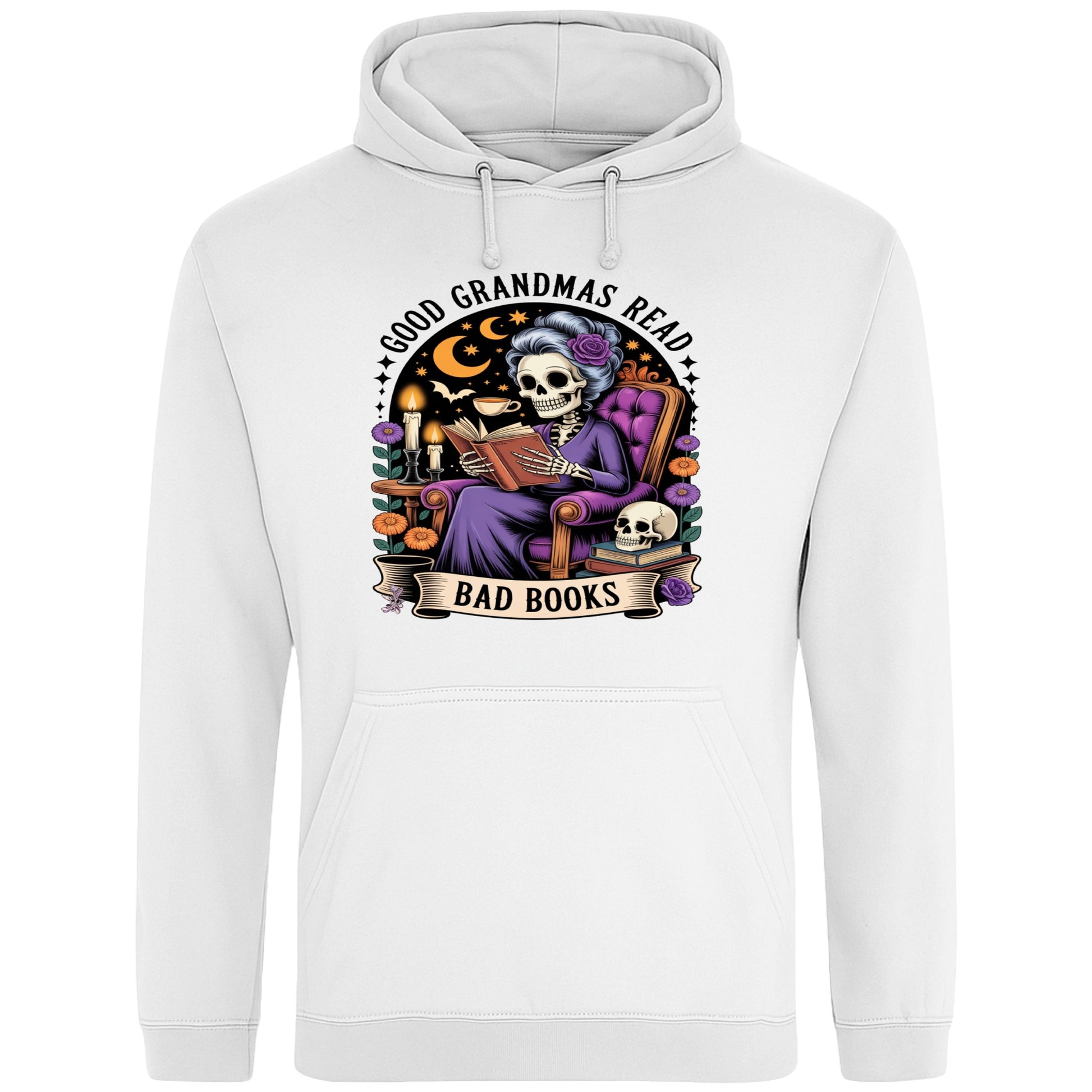 White Good Grandmas Read Bad Books Hoodie featuring a spooky cute skeleton grandma reading in a cosy armchair with candles and flowers, funny grandma hoodie for book lovers and gothic readers.