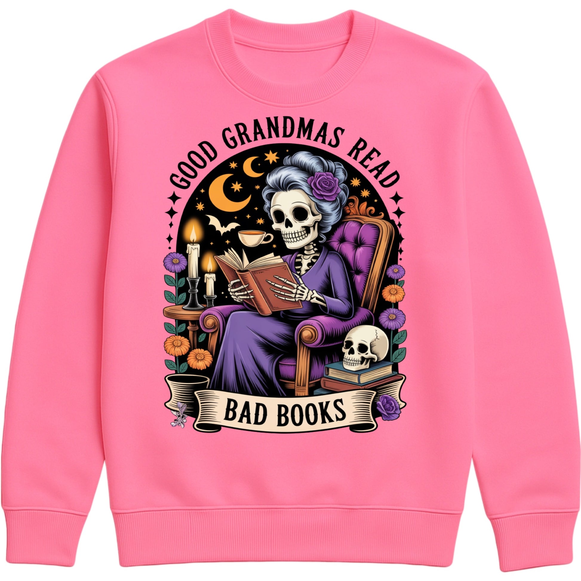 Candyfloss pink Good Grandmas Read Bad Books Sweatshirt featuring a spooky cute skeleton grandma reading in a cosy armchair with candles, flowers, and moon details, funny grandma sweatshirt for book lovers and gothic book lovers.