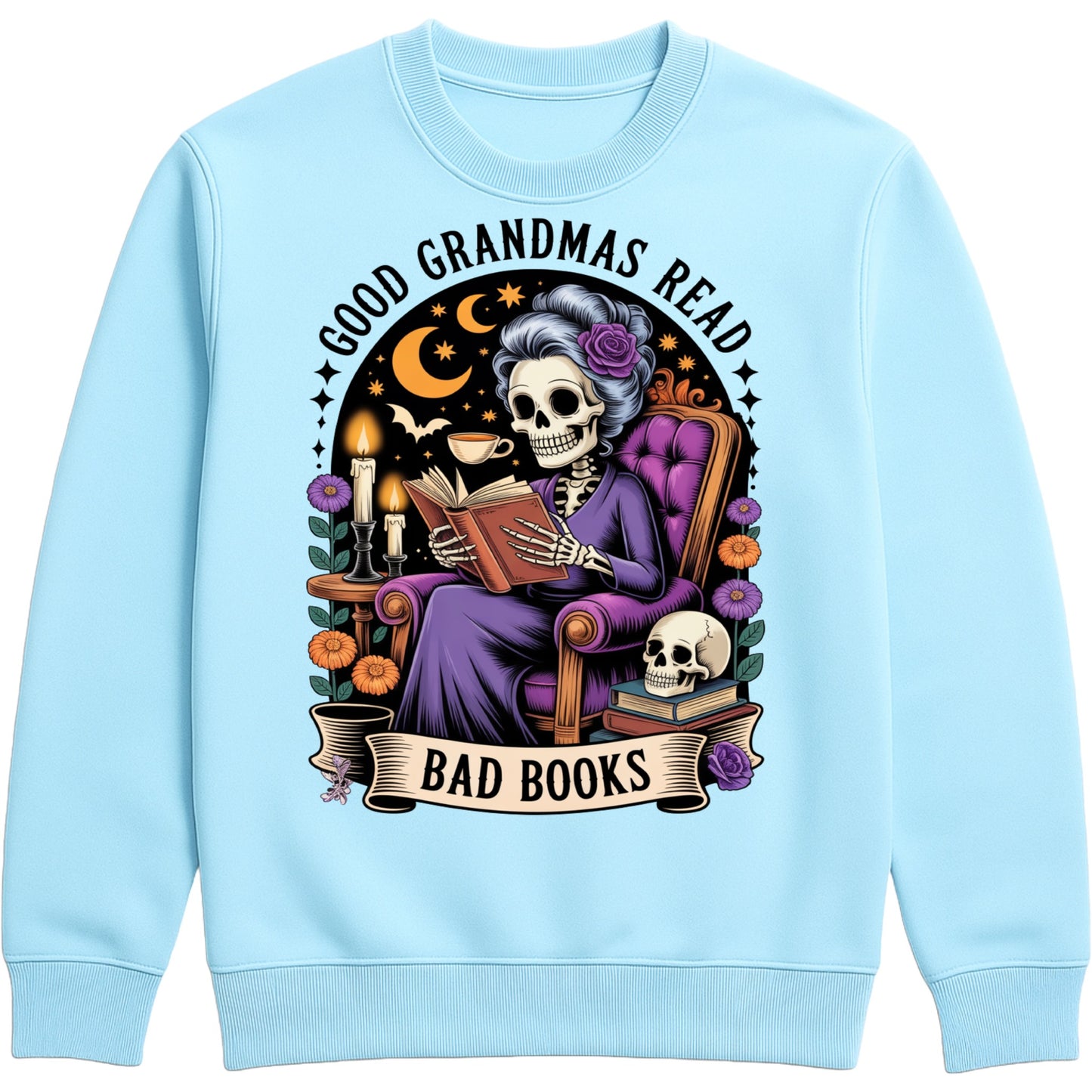 Sky blue Good Grandmas Read Bad Books Sweatshirt featuring a spooky cute skeleton grandma reading in a cosy armchair with candles, flowers, and moon details, funny grandma sweatshirt for book lovers and gothic book lovers.