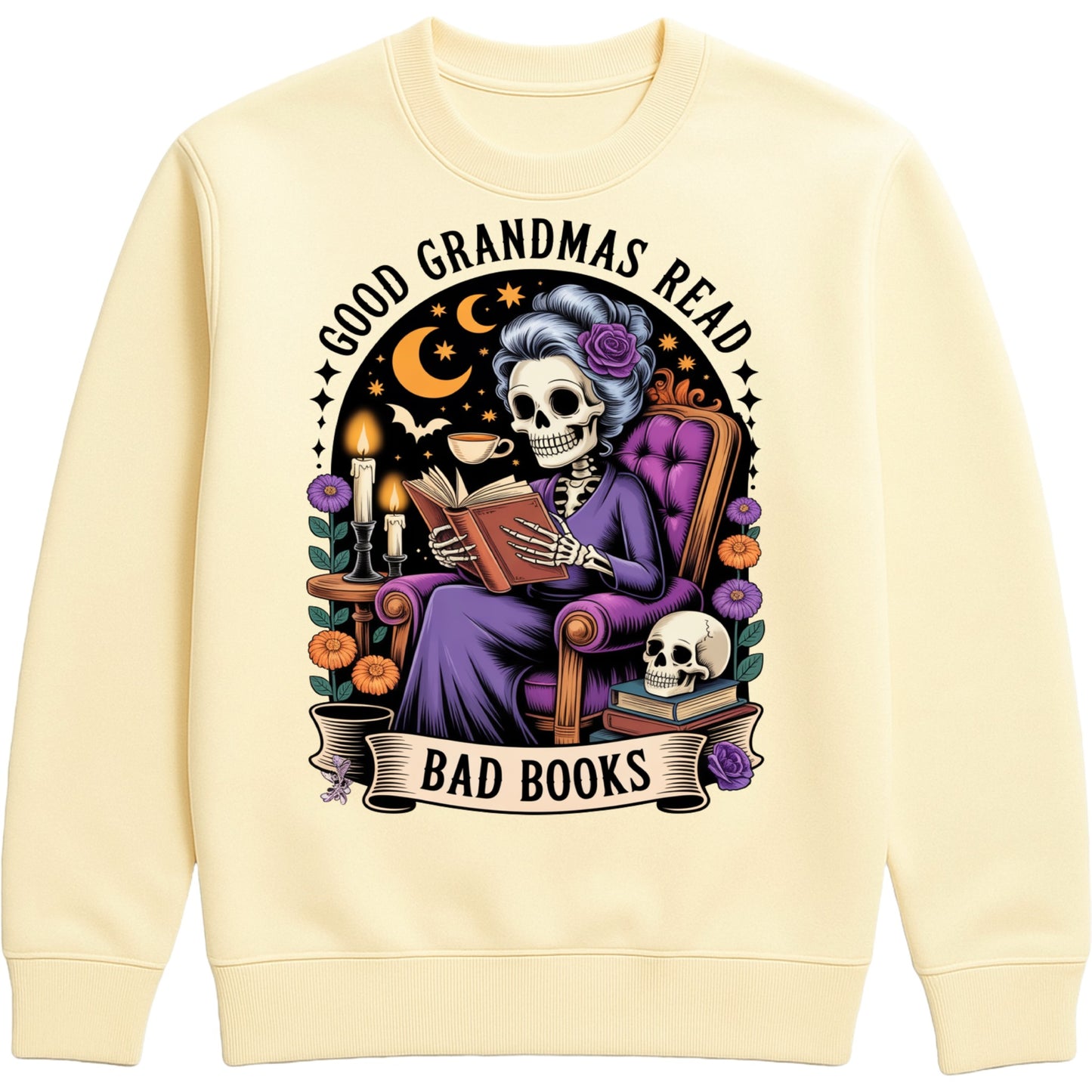 Vanilla milkshake colour Good Grandmas Read Bad Books Sweatshirt featuring a spooky cute skeleton grandma reading in a cosy armchair with candles, flowers, and moon details, funny grandma sweatshirt for book lovers and gothic book lovers.