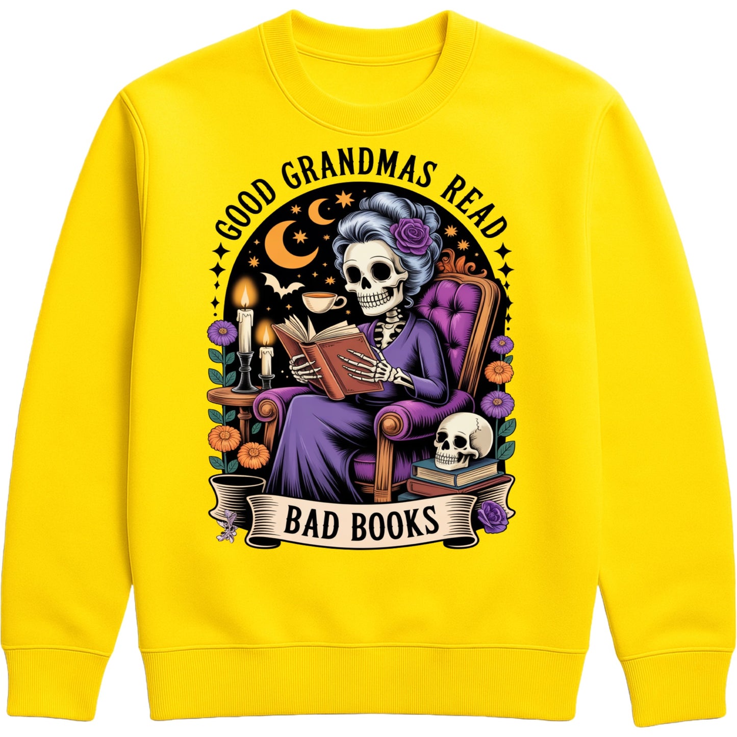 Yellow Good Grandmas Read Bad Books Sweatshirt featuring a spooky cute skeleton grandma reading in a cosy armchair with candles, flowers, and moon details, funny grandma sweatshirt for book lovers and gothic book lovers.