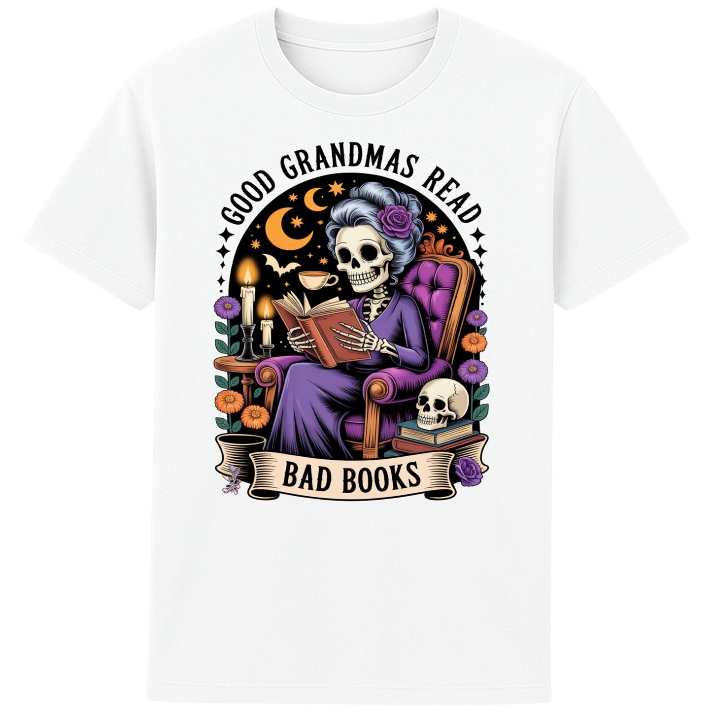 White Good Grandmas Read Bad Books T-Shirt featuring a spooky cute skeleton grandma reading in a cosy armchair with candles and flowers, funny grandma t shirt for book lovers and gothic book lovers.