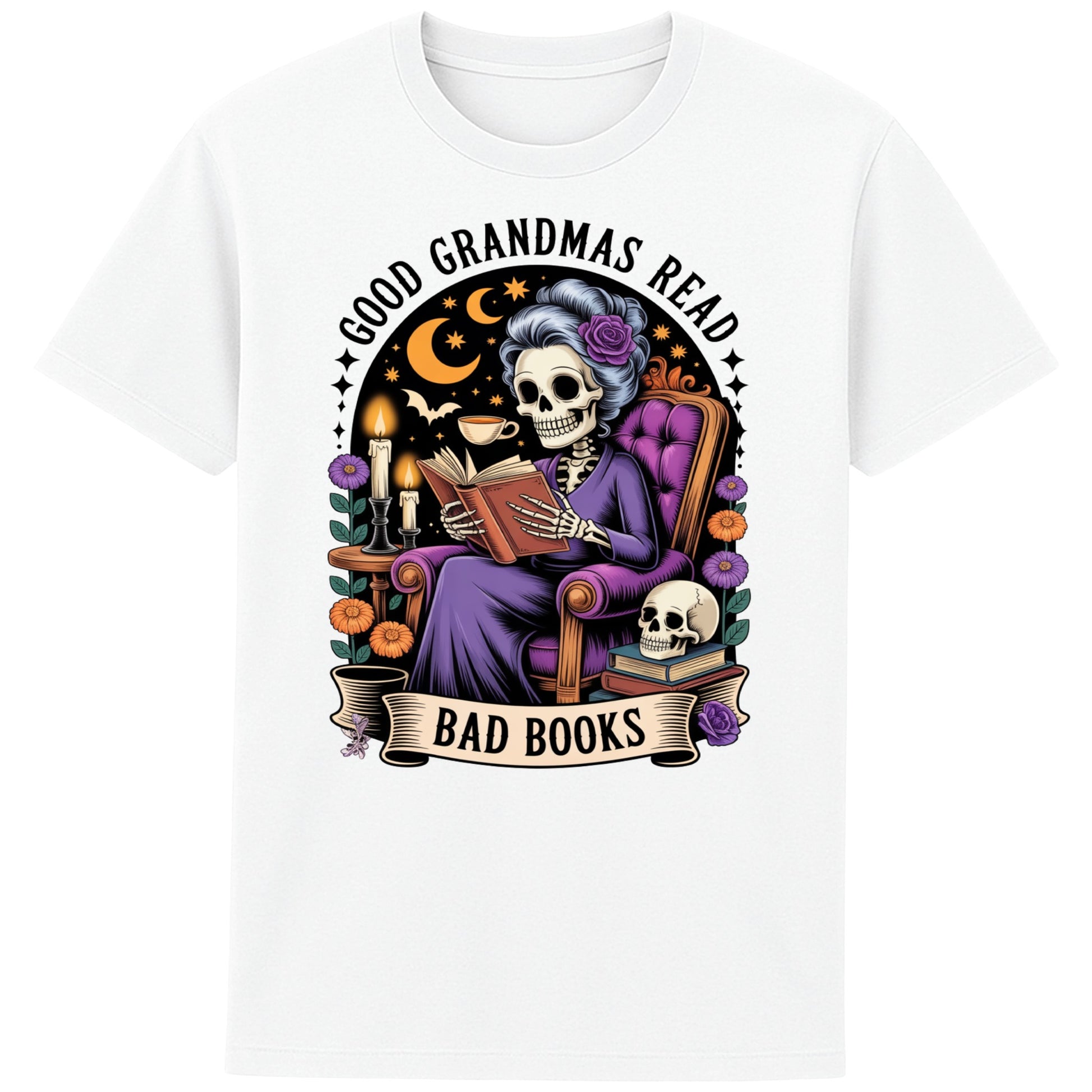 White Good Grandmas Read Bad Books T-Shirt featuring a spooky cute skeleton grandma reading in a cosy armchair with candles and flowers, funny grandma t shirt for book lovers and gothic book lovers.