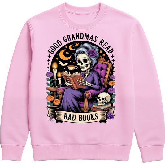Cosy pink sweatshirt with gothic skeleton grandma Good Grandmas Read Bad Books design ideal gift for bookworms and quirky grandmas.