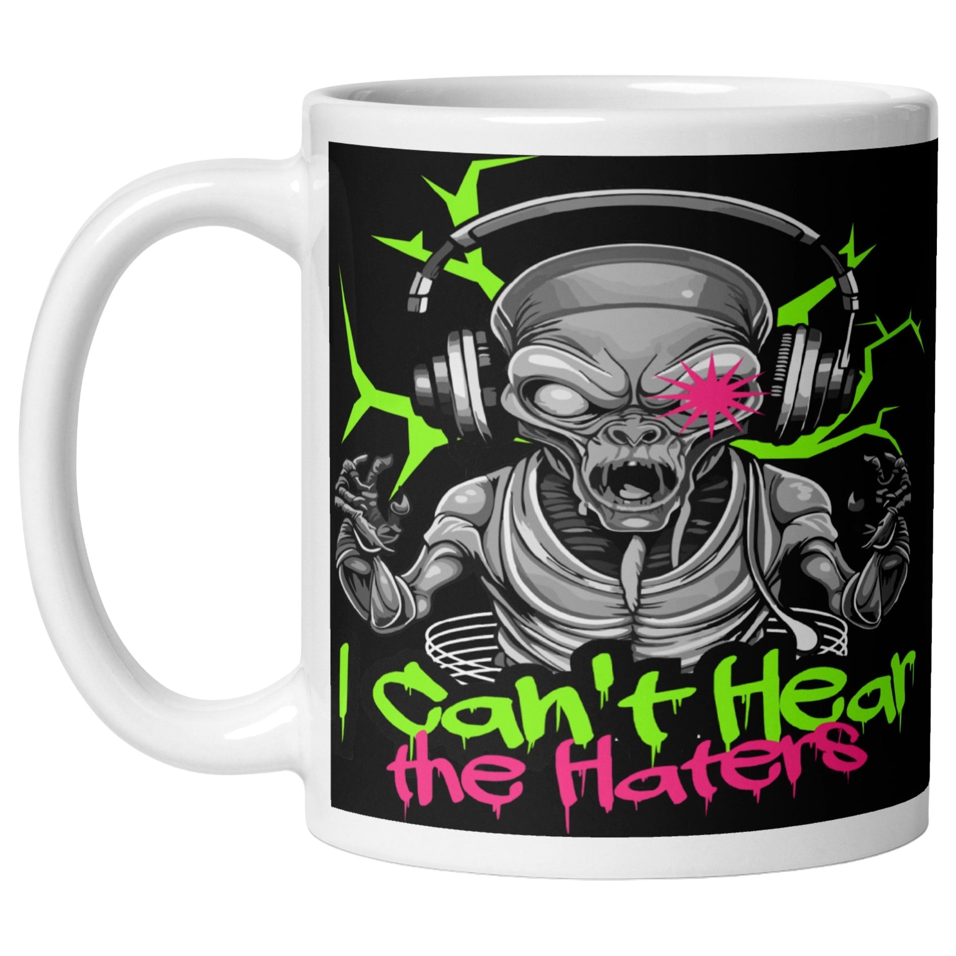 White coffee mug featuring a neon alien wearing headphones with the phrase "I Can't Hear The Haters", funny alien coffee mug for music lovers, gamers, and sci fi fans.