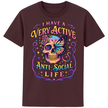 Red Brown graphic t-shirt with a glowing neon skull crowned in roses and a butterfly, paired with the bold phrase “I Have a Very Active Anti-Social Life.” Perfect mix of gothic and psychedelic vibes.