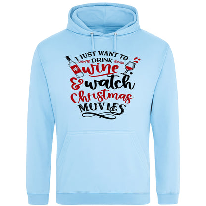 Sky Blue hoodie with festive text that reads “I Just Want to Drink Wine and Watch Christmas Movies” in red and black, featuring a wine bottle and glass graphic,