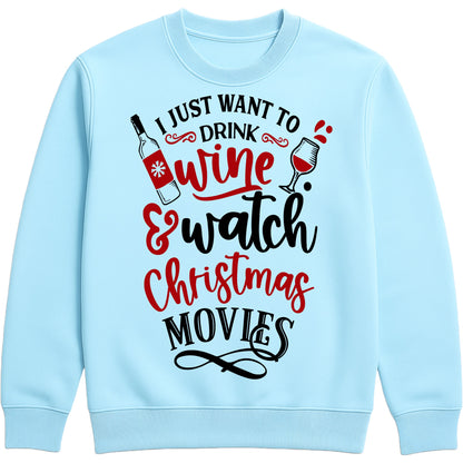 Sky blue I Just Want To Drink Wine & Watch Christmas Movies sweatshirt featuring a festive wine bottle and wine glass design, perfect for Christmas movie nights, wine lovers, and cosy holiday evenings.