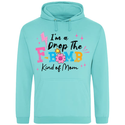 Peppermint colour hoodie featuring the phrase "I'm A Drop The F-Bomb Kind Of Mom" in colourful retro typography with floral accents, funny mom hoodie design celebrating real motherhood with humour.