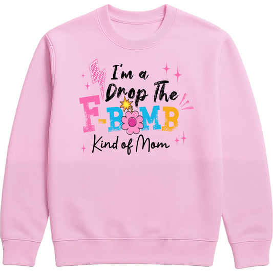 "Funny pink 'I’m a Drop the F-Bomb Kinda Mom' sweatshirt with bold graphic text and playful design, cozy crewneck style for moms."