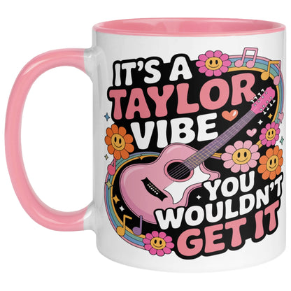 It's A Taylor Vibe You Wouldn't Get It retro music coffee mug with a colourful guitar, flowers, rainbow accents, musical notes, and playful typography, featuring a pink handle and interior for pop music lovers.