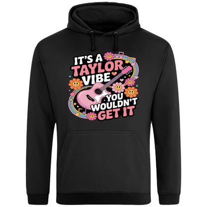 Black It's A Taylor Vibe You Wouldn't Get It retro music fan hoodie in pink featuring a colourful guitar, flowers, rainbow accents, musical notes, and playful typography for pop music lovers and concert fans.