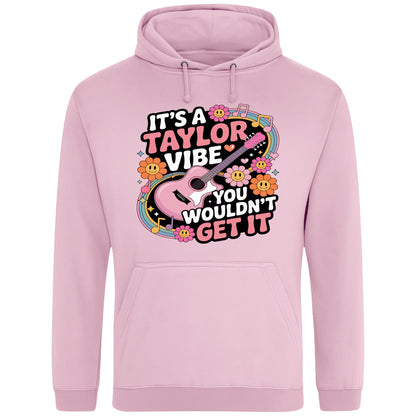 Pink It's A Taylor Vibe You Wouldn't Get It retro music fan hoodie in pink featuring a colourful guitar, flowers, rainbow accents, musical notes, and playful typography for pop music lovers and concert fans.