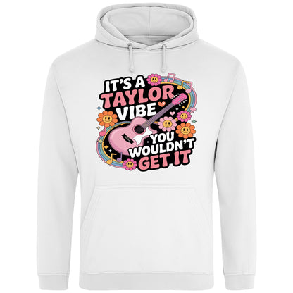 White It's A Taylor Vibe You Wouldn't Get It retro music fan hoodie in pink featuring a colourful guitar, flowers, rainbow accents, musical notes, and playful typography for pop music lovers and concert fans.