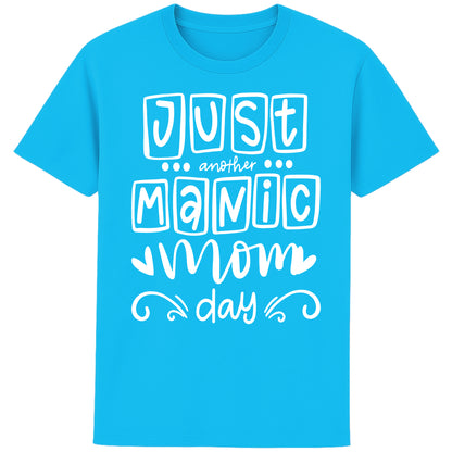 An aqua blue funny mom t-shirt featuring "Just Another Manic Mom Day" in bold white lettering. Humorous mom life shirt and thoughtful Mother's Day gift for busy mums.