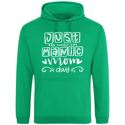 A kelly green hoodie with 'Just Another Manic Mom Day' printed on the front, styled for casual everyday wear, perfect for moms balancing busy lives.