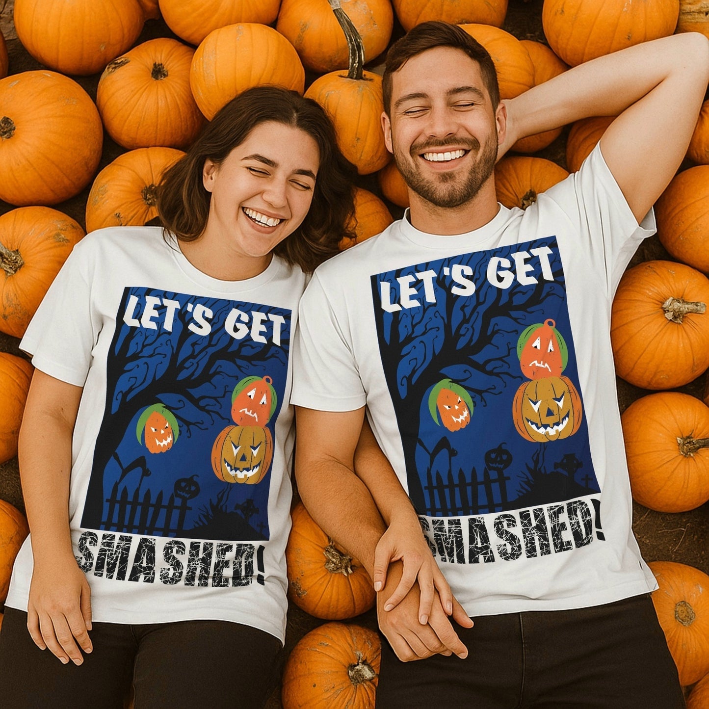Two people wearing 'Let's Get Smashed' Halloween-themed t-shirts surrounded by pumpkins.