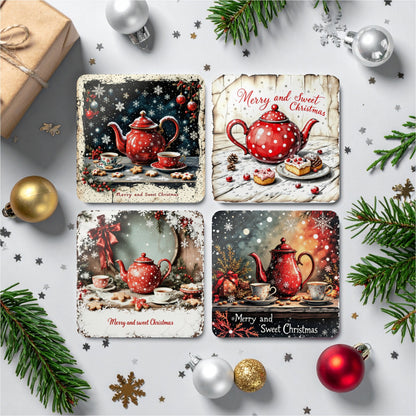 Lifestyle mockup of a mixed set of four Merry & Sweet Christmas cork-backed coasters featuring festive red teapots, teacups, snowflakes, and Christmas decorations surrounded by pine branches and baubles.