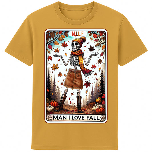 A ochre colour graphic t-shirt featuring a stylish skeleton in fall attire with the phrase “M.I.L.F. – Man I Love Fall,” surrounded by autumn leaves and pumpkins.