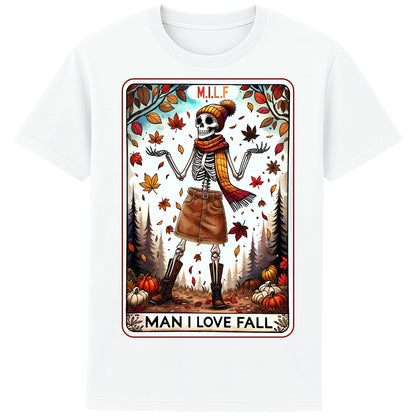 A white graphic t-shirt featuring a stylish skeleton in fall attire with the phrase “M.I.L.F. – Man I Love Fall,” surrounded by autumn leaves and pumpkins.