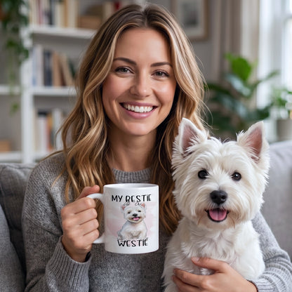 Woman holding the My Bestie Is A Westie Mug while cuddling a happy West Highland White Terrier, lifestyle mockup showcasing a Westie coffee mug for dog lovers and Westie owners.