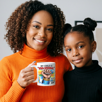 Smiling mother holding a My Child Is Non Verbal But Her Mama Ain't autism awareness mug featuring a raised fist and autism ribbon design while standing beside her daughter in a warm family lifestyle setting