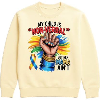 Vanilla Milkshake colour sweatshirt featuring the quote "My Child Is Non Verbal But Her Mama Ain't" with a raised fist, colourful autism awareness ribbon, and vibrant autism advocacy design promoting autism acceptance, inclusion, and support for autism moms.