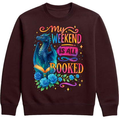Cosy hot chocolate colour sweatshirt with whimsical blue dragon, roses, and “My Weekend Is All Booked” — the ultimate book lover’s outfit