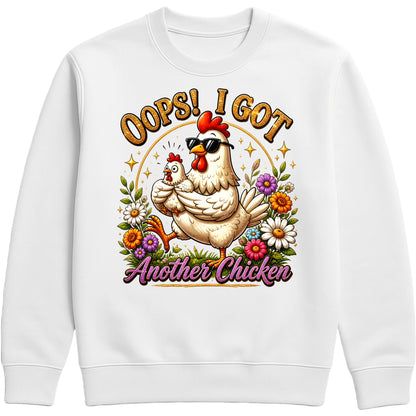White Oops! I Got Another Chicken Sweatshirt featuring a funny hen wearing sunglasses with a chick, colourful wildflowers and playful farmhouse artwork for chicken lovers.