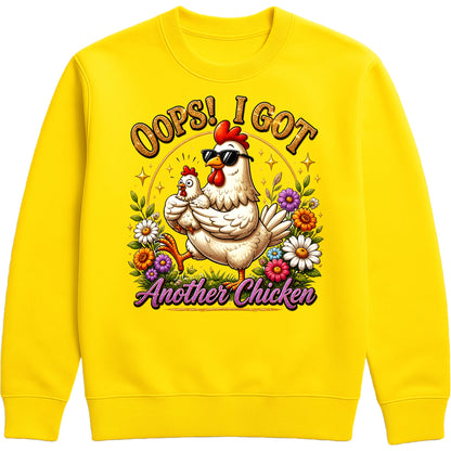 Yellow Oops! I Got Another Chicken Sweatshirt featuring a funny hen wearing sunglasses with a chick, colourful wildflowers and playful farmhouse artwork for chicken lovers.