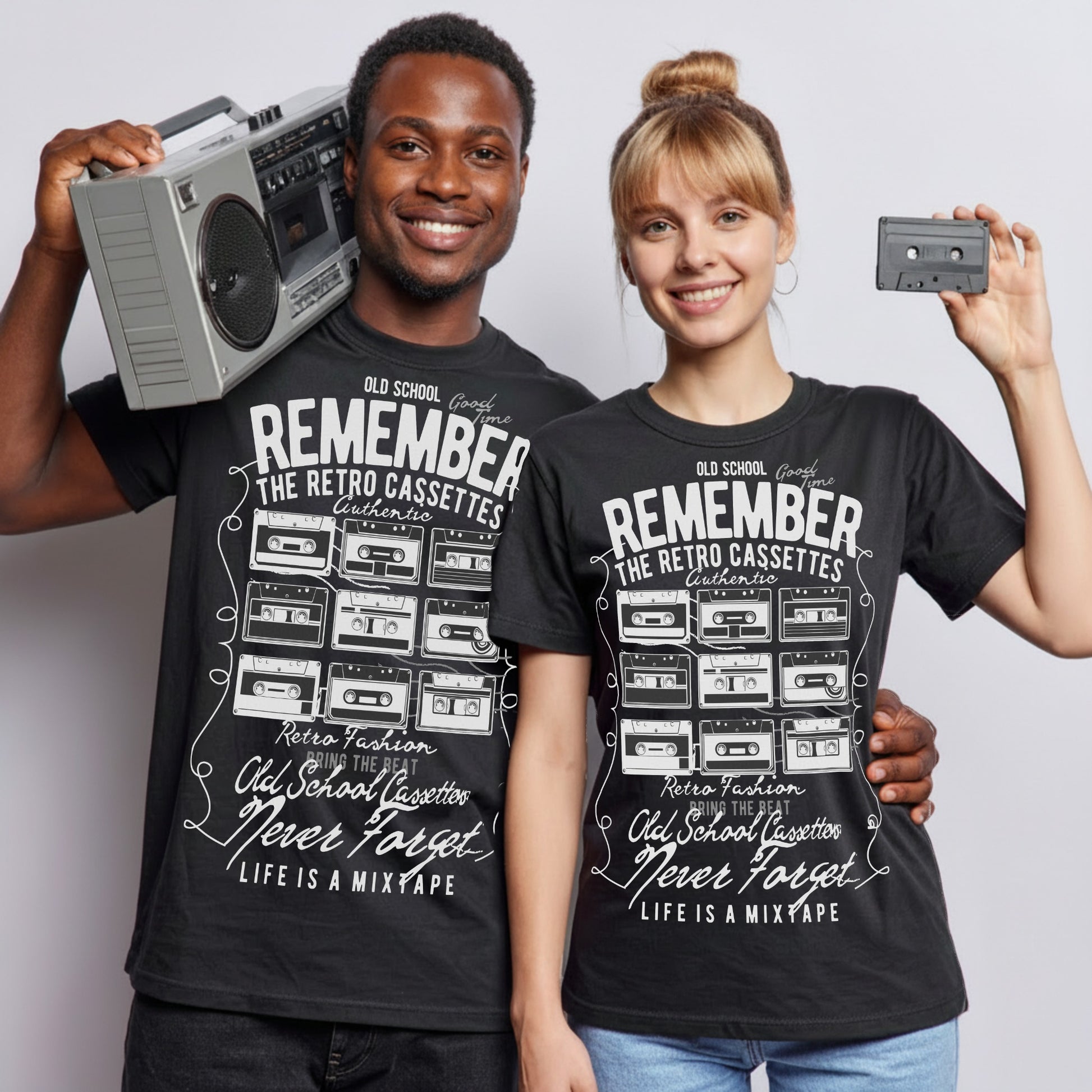 Man and woman wearing the Remember The Retro Cassettes black T-shirt featuring a vintage cassette tape graphic, with a retro boombox and cassette tape for an 80s and 90s music-inspired lifestyle mockup.