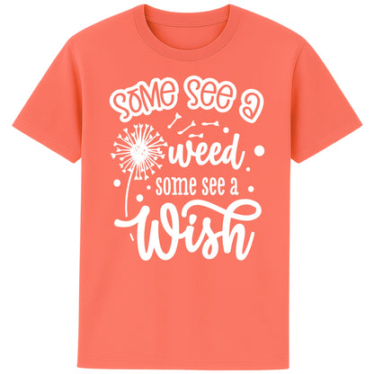 Fiesta colour Some See A Weed Some See A Wish dandelion t-shirt featuring an inspirational positive quote with botanical dandelion artwork. Nature lover shirt and thoughtful gift for gardeners and flower lovers.