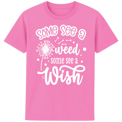 Pink Some See A Weed Some See A Wish dandelion t-shirt featuring an inspirational positive quote with botanical dandelion artwork. Nature lover shirt and thoughtful gift for gardeners and flower lovers.