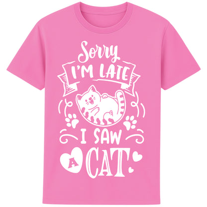 Funny cat lover T-shirt in bubble pink colour featuring a cartoon cat, paw prints, hearts, and the phrase "Sorry I'm Late, I Saw A Cat".