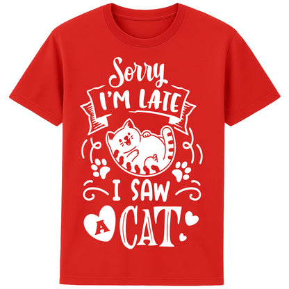 Funny cat lover T-shirt in red featuring a cartoon cat, paw prints, hearts, and the phrase "Sorry I'm Late, I Saw A Cat".