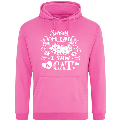 A playful candyfloss pink hoodie with white text and a charming design on the front. It reads: "Sorry I'm late I saw a cat" accompanied by a cartoon cat illustration, paw prints, and whimsical accents. Perfect for cat lovers and those who embrace their feline-induced tardiness with humor.