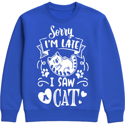 A royal blue colour sweatshirt with white text and a charming design on the front. It reads: "Sorry I'm late I saw a cat" accompanied by a cartoon cat illustration, paw prints, and whimsical accents. Perfect for cat lovers and those who embrace their feline-induced tardiness with humour.